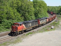 A pair of GE Dash8-40CM's with the Draper Taper lead a westbound at Bayview Jct. June 2011.  