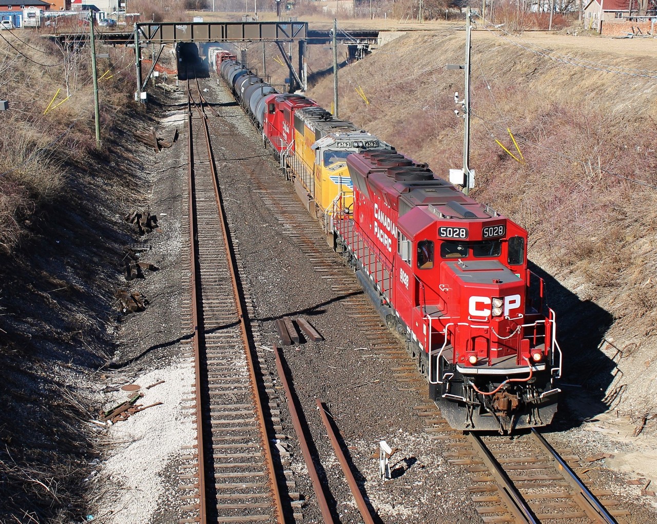On a beautiful, warm February afternoon CP T-40 screams out of the Detroit River Rail Tunnel after a morning of interchange work with CSX and NS in Detroit.