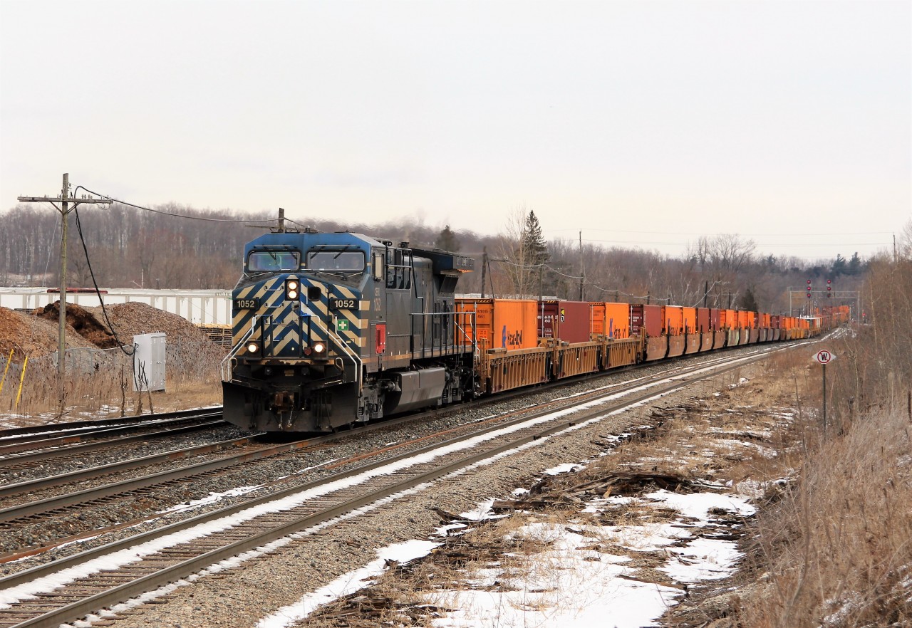 I can safely say that this is the longest train I have saw travel through Guelph Junction in quite a while. CP 143 today has CEFX 1052 with mid-DPU 8768 hauling this 600 axel, 12,000+ foot train through Guelph Junction on its way to Wolverton.