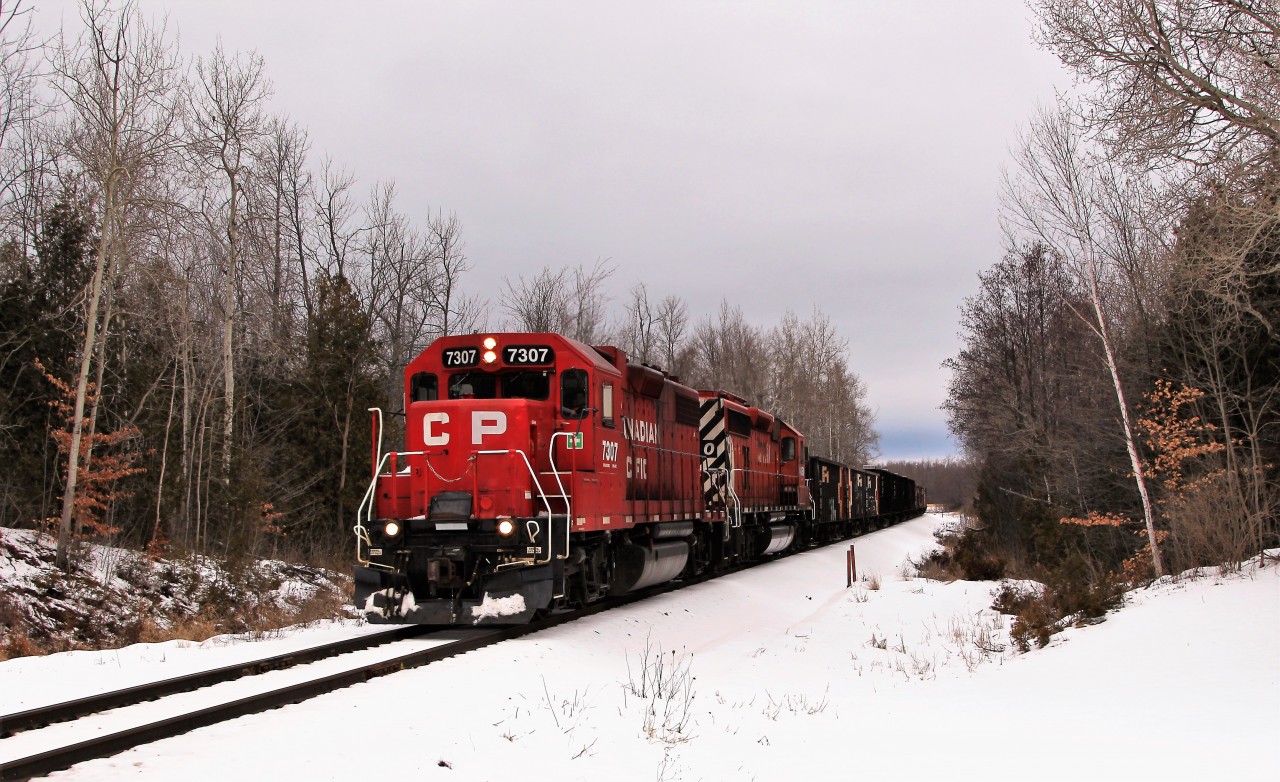 The managers train heads south led by CP 7307 (GP38-2) with CP 6050 (SD40-2) on their journey to Kinnear Yard. CP 7307 has an interesting past as former DH 7307, GTI226, DH 7320 and LV 307.
