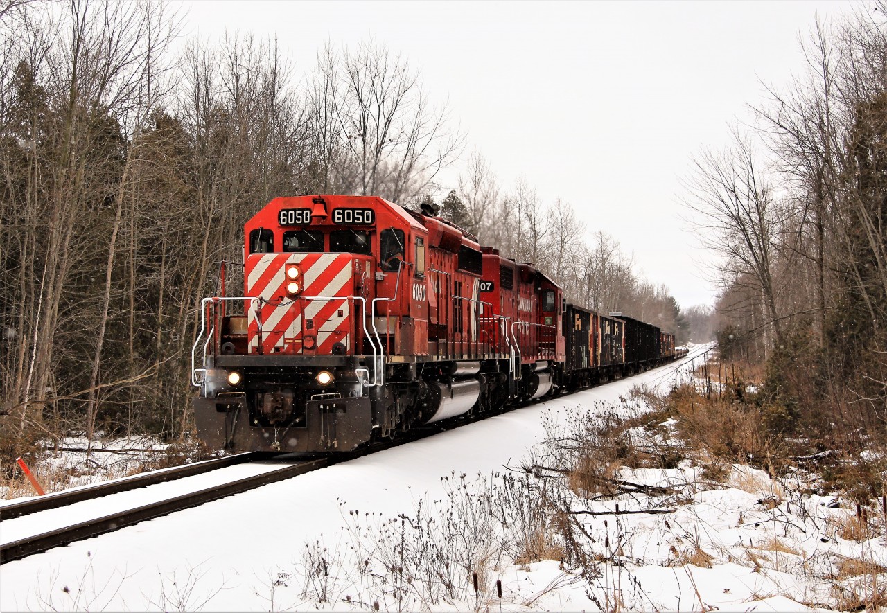 Todays manager train brings another nice pair for power in (SD40-2) CP 6050 and (GP38-2) CP 7307 as they head north across the Milburough Line on the return trip to Hornby.