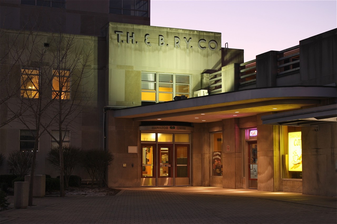 The early morning hours find the entrance to the one time Toronto ,Hamilton & Buffalo station seem very lifeless, but this is only temporary, as GO Transit commuter trains idle away above awaiting the morning rush hour call to duty. Soon hordes of Toronto bound commuters will gather in the main lobby and on trackside platforms. The old TH&B station has been beautifully restored, inside and out.