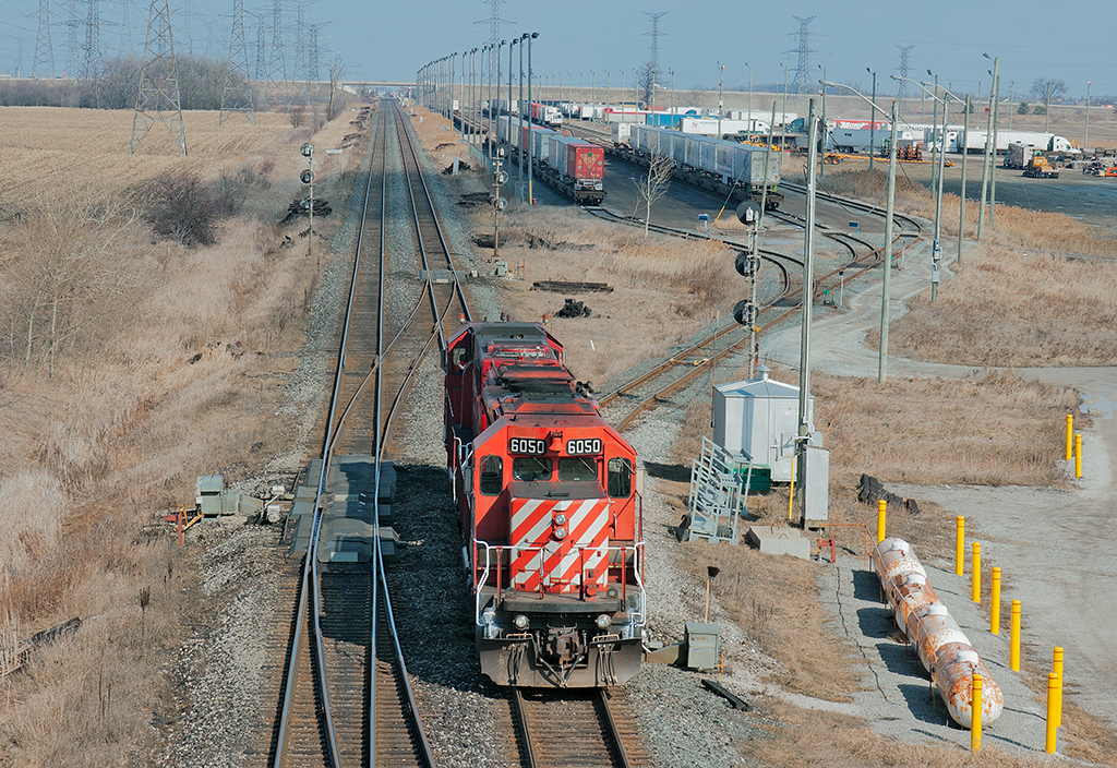 A management training run to Guelph Jct and back is now returning to Hornby, the power will back in at the east end of the yard for the trip east to Montreal on train 132. It's nice to see a few old solders out as many of her sisters sit dead waiting a call back to active service or worse, scrap.