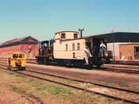 43 ton "Willie" pushes a caboose with railfans while others ride a  CP Rail speeder at the Railway Days weekend at St.Thomas.