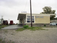 The former Midland Rwy reached its' namesake on Georgian Bay in the 1800s. The CN station pictured here is now gone, as is the track and everything associated with it. In 1994 the "Rail Trail" was opened up along the old railroad route, as being done in so many localities. Midland Dock was the end of this line in from Orillia, and at one time a lot of Georgian Bay shipping went on here, mostly grain and lumber. In this view, CN 1206 and caboose wait out the now quiet weekend. I'm disappointed a big annoying pole is in the photo, but it could not be helped. Slightly too big for my clippers. :o)