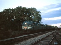 A pair of NYC E7's head up train 51, arriving at Hamilton from New York City in June 1961.