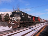 NS-9369 a C-40-9W leading loco with CN-2656 a C-44-9W pulling a short convoy of freights card coming from Southwark yard to Taschereau yard near Dorval 