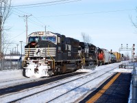 N2591 a SD-70m lead loco with NS-9906 C44-9w also CN-4720 GP-38-2s the to NS was with the 5locos arrivent on the 8 of Febuary and was part of 7 locos  going to Montréal today was on CN-route 527 going again to Taschereau yard with different freights cars 