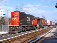 CN-5720 EMD-SD-60  with CN-2323 ES-44-DC also CN-4135 EMD-GP-9 CN-route 527 going to Taschereau yard add to stop on Victoria bridge to try to repair a hose on a car in the back of x321 that have lost is air brake could not repair so the 321 leave the to cars on bridge and 527 have bring the 2cars in Point-St-Charles yard and X321 could leave for Toronto the 2 mains lines block for over a 1 hour 