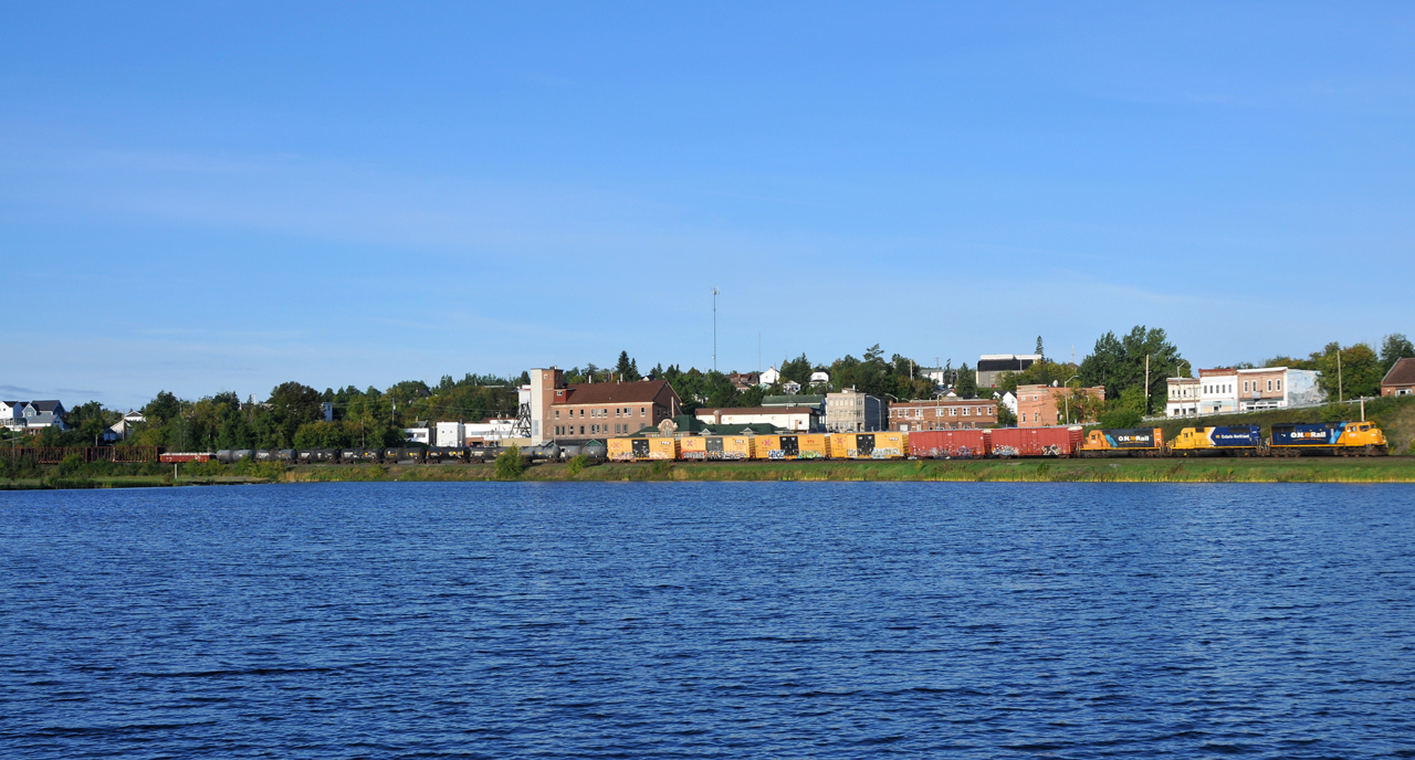 Ontario Northland Railway train 113 getting back under way after setting off three gondolas in the siding at Cobalt.
 

The consist is ONT 2101, ONT 1733, ONT 1734, and 35 cars