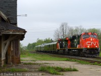 Having known this was coming ex Sarnia - I took a couple hours off work and found the best place I could think of to shoot this. I call this a juxtoposition - The Varnish of the Canadian National Railway passing the derelict Ingersoll station. Thanks to an overcast morning you can clearly see details in the sadly neglected structure including where the semaphores used to be located. There were efforts to preserve this structure about 10 years ago but it could not be done - too close to the bridge at the end of the driveway to safely turn it -  without having to move it over the CNR mainline (and I suppose that's just not going to happen - railways don't like shutdowns anymore!). Given how much time has passed and how further neglected this structure is (the roof  looks like it's made of paper now) any hope it had now rests in fate's hands. The fact it's still standing for this photo, let alone any in 2017 is nothing short of a miracle.<br><br>
This train , being passenger, ran at Passenger speeds. Chasing was not an option. I just went to work after this photo, as much as I'd love to have shot it again. I seem to recall they re-crewed on the Halton sub somewhere and made it to Montreal arriving around Noon. This photo was taken not long after #70 had detrained passengers at Ingersoll.