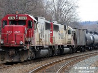 In response to <a href=http://www.railpictures.ca/?attachment_id=28249 target=_blank>Dave Burroughs 1968 Photo </a> photo at the same location, which I promised to dig out. While not quite exactly in composition (won't make the Time Machine I don't think!)  here's a matching pair of engines waiting for a crew to pull the train to Toronto in 2012. Now, the white SOO units are about to be eliminated as they are being sent for rebuild just like the rest of the CP 6200's in 2017. Further, using the Cemetary for a crew change is now the exception - used to be a daily occurence for the TH&B crews to change off.