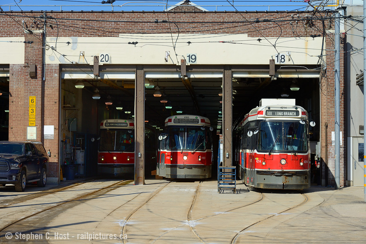And I don't always shoot electric traction - but here's one from the "I can't believe it's still here" department. Articulated LRV 4214 exits the Roncesvalles Carhouse for the 301 Long Branch - the 312 and 516 will also exit within minutes in a constant parade of 'on borrowed time' LRV's typical of the Toronto Transit Commission's streetcar network. I'm not a huge fan of the TTC, or really transit in general unless it has freight motors, but the Sunnyside pedestrian bridge is just behind me and full of grimy and dirty diesel action :) Shoot it while you can, it's on borrowed time, including the Sunnyside bridge - soon to be electrified and any photo angles you thought you had will be gone.