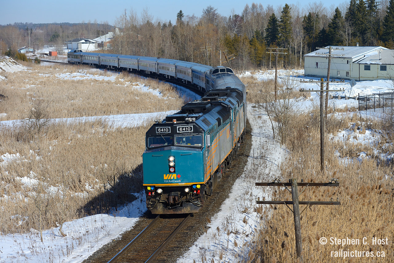 As winter quickly melts away, VIA Rail's flagship train "The Canadian" is only two hours from Toronto after a long three day journey from Vancouver. I'm lucky that the short winter trains fit entirely in the frame. Good luck in the summer!
