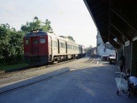 Budd Cars used to be so common. I was not much of a fan of them. But now, I kinda miss them. They have been away from the Southern Ontario scene since around 1990. This view shows the evening train from downtown Toronto rolling in to a stop at the quaint Unionville depot, on its way to end of its' run at Uxbridge. It is a tough angle, this shot, as it is 1808 and the sun is setting behind the old elevator next door on the other side of the parking area. Budds are: 6351, 6001, 6006 and 6401. CTG says the 6006 is now at Orangeville.
