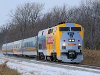 VIA 916-76, with a fresh "Canada 150" wrap, approaches Old Tecumseh Road at mile 94 on the VIA's Chatham Sub.