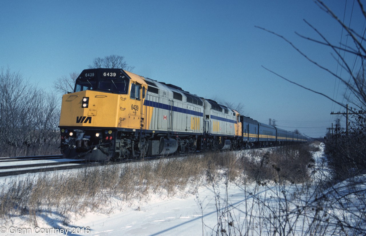 Another one from the steam to HEP transition. This one with a pair of F40s trailing a steam generator and eight coaches rolling past Mile 2 on the Dundas Sub.