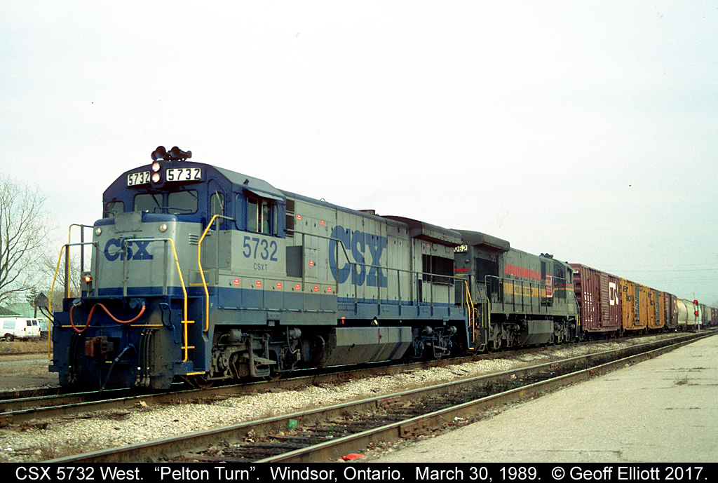 A couple 'southerners' from CSX are heading up the CSX Pelton Turn as it sits in front of Windsor South Depot waiting for a signal to head back to the U.S.  CSX 5732 is a former Seaboard Coast Line U36B while CSX 7062 is a former 'L&N' (under the Family Lines road) C30-7.