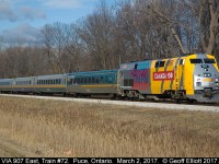 Having left Windsor 22 minutes previous, VIA train #72, with "Canada 150" wrap unit #907, speeds through Puce, Ontario on what certainly does not look like a March 2nd day.