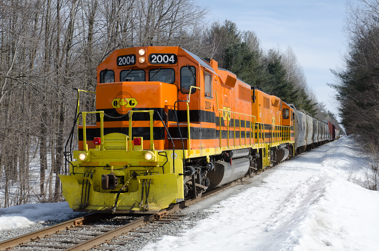 With horn blaring and the hounds howling, QG's STGA passes "Barking Dog Crossing" on its way to Thurso, QC.