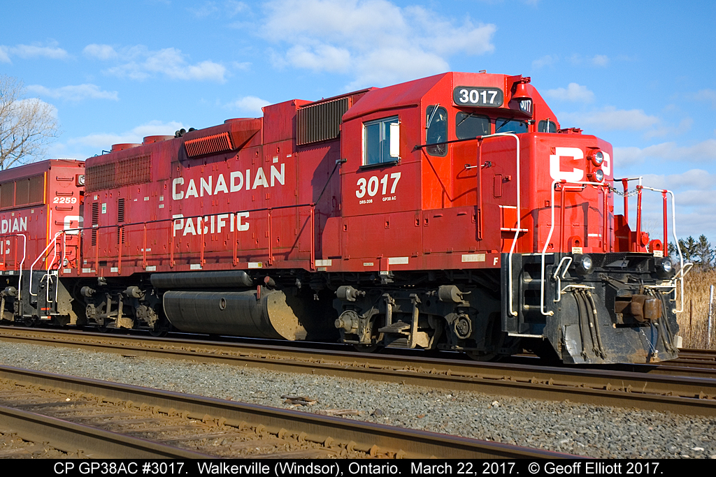 CP GP38AC #3017 rests as part of an e/b lift to made from the yard in Walkerville (Windsor), Ontario.
