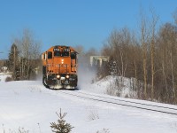 ONT 1735 SD40-2, ONT 2101 SD75I and ONT 2103 SD75I lead train 214 through mile 93 of the Temagami Subdivison at Latchford, ON.  The train has just crossed the bridge over the Montreal River and is quickly moving towards its destination of North Bay.