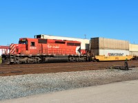 CP SD40-2 5996 is seen pulling cuts of intermodal well cars from to build up hotshot train 101. This was it's last stop before being sent into retirement. The crews seemed to prefer a single 3000hp SD over a pair of GP38-2's with 4000hp.