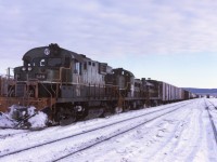  December 1973 the Fort Saint John has arrived back at Chetwynd BC after an all night trip to Fort Saint John and return. The John Turn left Chetwynd every evening north bound, setting off empty tank cars at Taylor and proceeding along to Fort Saint John. The crew would wye the power, build their south train and quite often take a meal break. Proceeding south with various loads of wood products, grain and other cargo, would stop at Taylor and pickup various loaded tank cars of petroleum products from the refinery there. After departing Taylor, the train would cross the Peace River and then the grind up a two percent grade to Septimus and then on to Chetwynd. The trips quite often were twelve or more hours on duty.