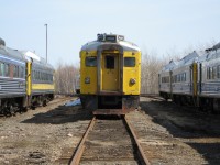  One of the fleet of ex VIA RDC's bought by Industrial Railway Services in Moncton rests among friends next to the former CN diesel shop. The original plan was to remanufacture the cars for resale but few received any work. Sadly the company has since folded and all but a handful of the cars have been cut up for scrap.