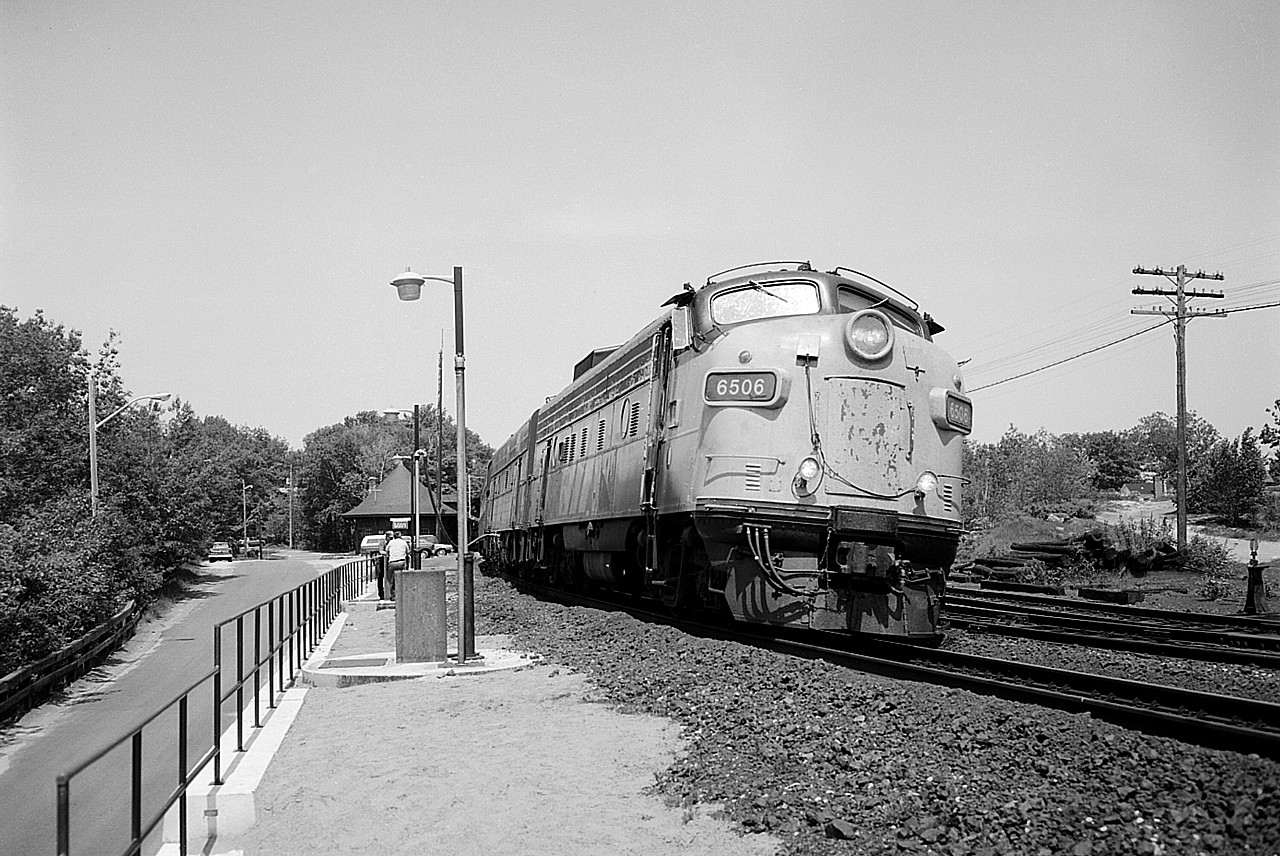 Southbound Toronto portion of the 'Canadian' stopped at Parry Sound CP station. This B/W is shot with the Speed Graphic, 200 f11 with Kodak T-Max 400 pro film. Note the 'portable' ditch lights. Behind VIA 6506 is 6620. I was out to capture as much as I could in VIA service before the life of the old cab units expired; which was but a little over a year off with the introduction of the F40-PH power we see these days.