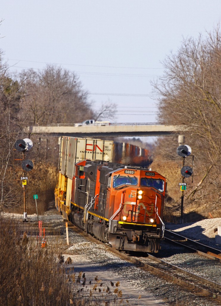 Lean(ing) EMD's. A nice pair of EMD's guide 148 through the curve at Copetown, starting the grade down to Bayview at a nice and easy 15 MPH (ish). A couple of miles behind 148 is 384 lined to follow 148 downgrade after working Paris.