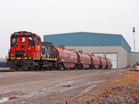 Spending the day idling away, CN 7304 now resides at the steel center shuffling around rail cars. 