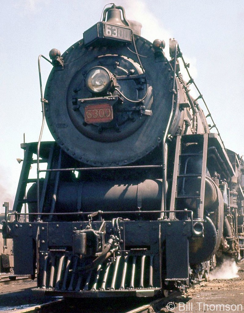 A front view of Canadian National U3a Northern class-unit 6300 at Mimico in 1958. Formerly one of Grand Trunk Western's 6300-series units built by Alco in 1927, 6300-6311 were eventually sent north of the border and ran out of Mimico on CN, gradually receiving CN wafer logos on their tenders.

6301 at Clarkson station: http://www.railpictures.ca/?attachment_id=13305
6301 rear view at Mimico: http://www.railpictures.ca/?attachment_id=26621