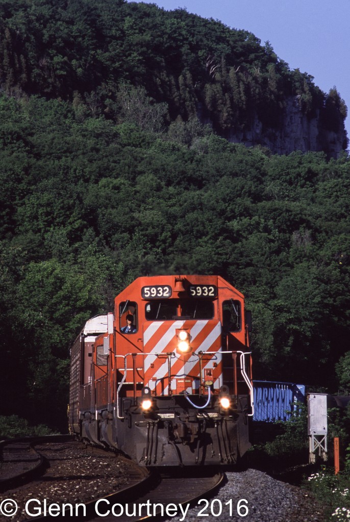 For a few years around the early 1990s I shot at this location fairly regularly. It was close to home, accessible but quiet and most days I would see 2-3 eastbounds in a morning. The only minor negative was that there was no way what track a train would be on. You usually got a little bit of warning that a train was coming and then just had to be ready to adjust quickly to whatever track it was on.