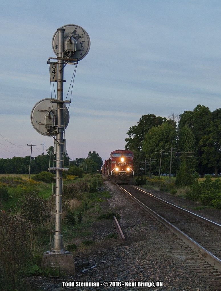 After checking the signals and seeing how 8627 had it "clear" (top signal green, lower signal red)...I could not figure out why it was still stopped on the main at Kent Bridge (there is no Tim Horton's nearby!). However, it made for some good photo opportunities to say the least!