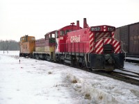 In keeping with the current theme of things, here is another SW1200RS image. CP 8157, along with TH&B 51 (NW2u) and caboose has just made the trek up from Hamilton. This image is of it on the curve where the line meets the Galt Sub. Back then the line was referred to the Goderich Sub. Since the line thru to Goderich was taken up, the track as been referred to as the Hamilton sub. CP 8157 became CP 1243 in 1982, then dealt off to Louis Dreyfus Corp, a world wide company, as their 2003 in 1998. No idea where that unit is now.