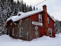 On the way back from shooting the Windmill train in the Gaspe, we stopped in Routhierville, Qc to hopefully shoot CN 562, which was coming from Mont-Joli light power to Matapedia to pick up the windmill train. After a 5 minute wait, we gave up as it was quite cold and we figured it had already passed. It turns out the train had struck a skidooer a bit further north, in the town of Causapscal.

At least I was able to shoot this out of use train station; if the info I found online is correct, it was built in 1878 for the Intercolonial Railway. The track out back is CN's Mont Joli Sub, used only by VIA 14/15 (overnight) and local traffic between Mont-Joli, Qc and Campbellton, NB. 