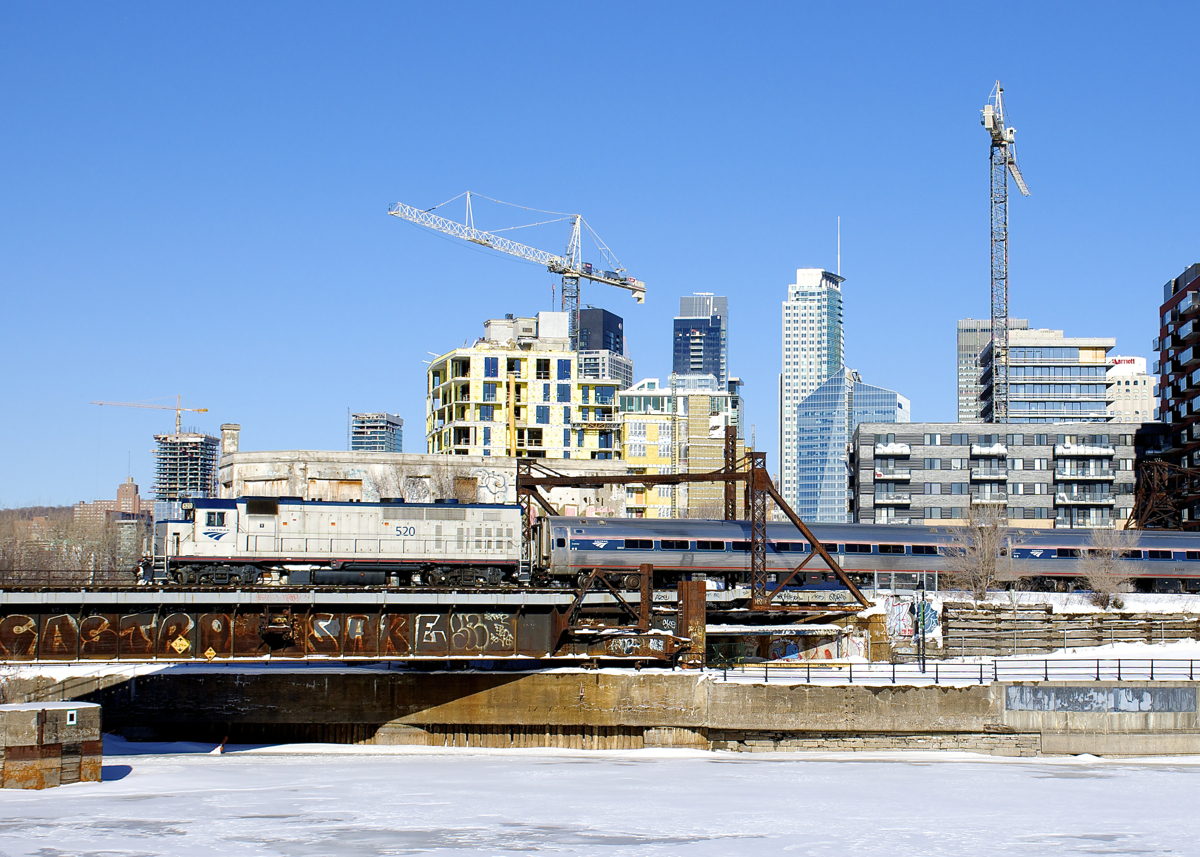 With word from upstate New York railfans that AMTK 69 (the northbound Adirondack) left Albany with a GP38H-3 as sole power yesterday, I was one of many railfans to shoot it on AMTK 68 today. Here the ex-GP40TC (built by GMD in London, Ontario for GO Transit just before its startup) is pushing the deadheading train towards Central Station 80 minutes before departure. This may be the first time one of these units has been the sole power on a medium-distance train such as the Adirondack. It certainly made a nice change from the usual Genesis Series power.