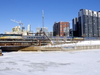 VIA 605/607 for northern Quebec is passing Wellington Tower in Montreal. At Hervey Jct this train will split, with the lead F40 and two cars going to Jonquière and the other half going to Senneterre.