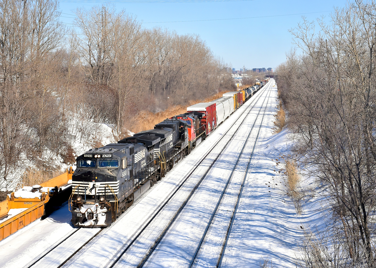 NS power all over the place in Eastern Canada. NS power enters Montreal on a daily basis on run-through train CN 529 (aka CP 931, aka NS 31T) but that NS power is sometimes used on other trains, and today must have been a record example, with NS units leading CN 407 in Nova Scotia and CN 327, CN 461 and CN 527 in the Montreal area. Here CN 527 approaches Taschereau Yard with NS 9293, NS 8981 & CN 2673.