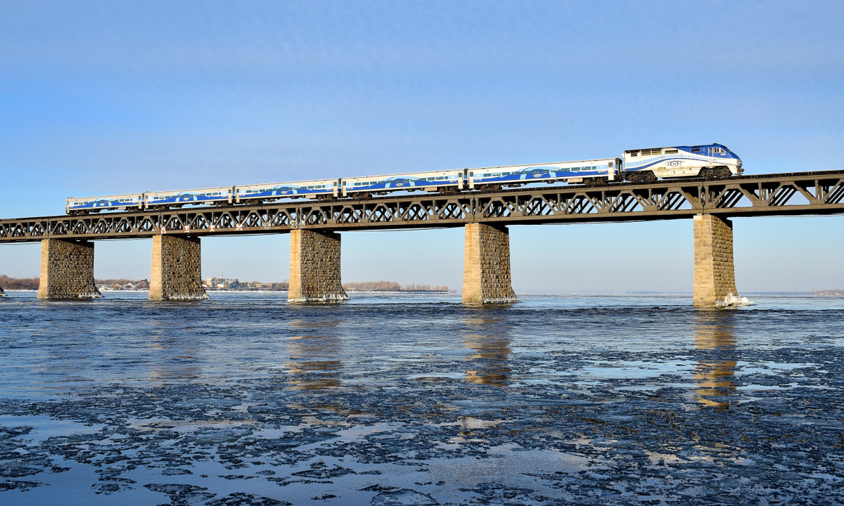 It's officially spring, but there's still a bit ice on the St. Lawrence River and it's -10 as AMT 76 makes its way towards the island of Montreal during the morning rush hour.