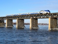AMT 1327 pushes a deadhead move over the St. Lawrence River during the morning rush hour.