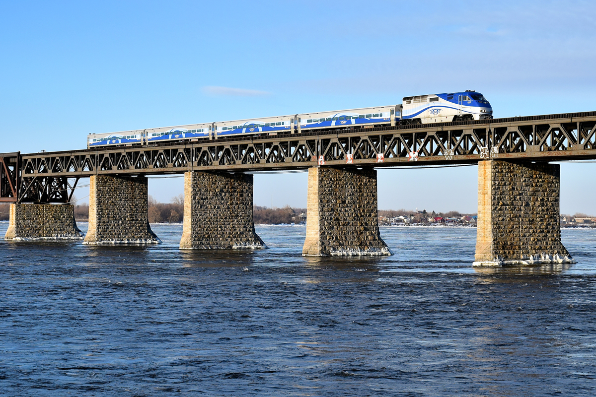 AMT 1327 pushes a deadhead move over the St. Lawrence River during the morning rush hour.