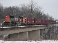 It's been a slow and bitter cold morning for railfanning, and while waiting for TR 1859, I ended up in Port Rob to catch what I believe is CN 530, a local job that brings cars from the Port Robinson yard to Feeder. 5671 was one of the units on CN 421 that morning. The other units will bring cars to Fort Erie for interchange. This train always runs long hood forward to Feeder yard. 