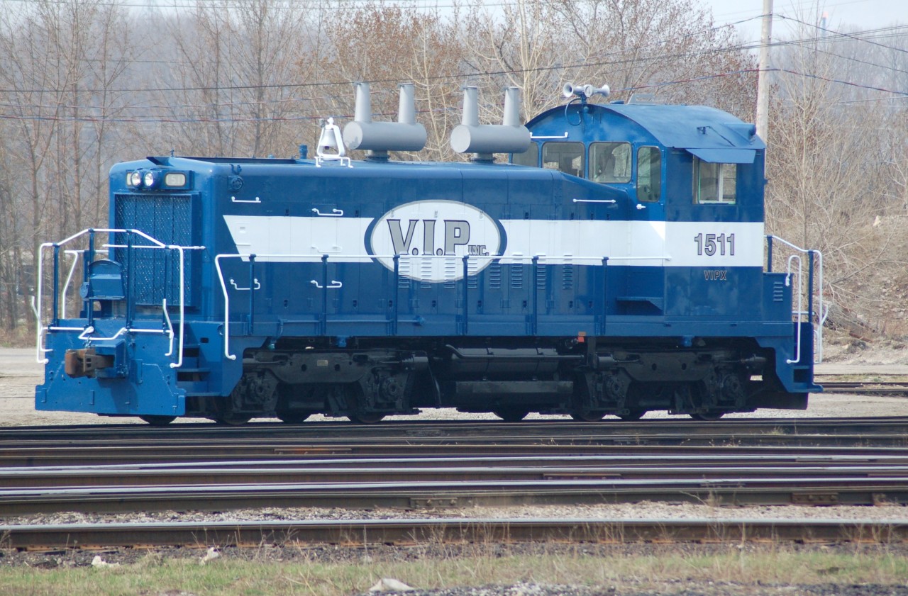A SW1200RS of a different sort. Here we find VIPX (Vidal Industrial Park) #1511 sitting at the Lambton Diesel shop on the west end of CN's "C" yard at Sarnia. It has just been overhauled and repainted prior to VIP starting operations in Sarnia.  The 1511 was originally built for Grand Trunk Western and also served on the Central Vermont see http://www.railpictures.ca/?attachment_id=8938 for a before photo.