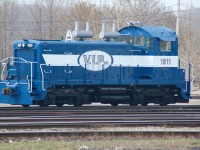 A SW1200RS of a different sort. Here we find VIPX (Vidal Industrial Park) #1511 sitting at the Lambton Diesel shop on the west end of CN's "C" yard at Sarnia. It has just been overhauled and repainted prior to VIP starting operations in Sarnia.  The 1511 was originally built for Grand Trunk Western and also served on the Central Vermont see http://www.railpictures.ca/?attachment_id=8938 for a before photo. 