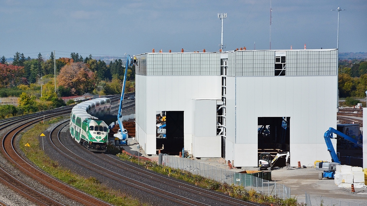 The ERMF continues to take shape


“The East Rail Maintenance Facility (ERMF) will be an approximately 500,000 square foot facility located in Whitby that will provide mechanical maintenance, body repair, as well as day-to-day cleaning and operational services – all essential in order to provide backend support for regional rail expansion. “ per Metrolinx website.


Certainly could make good use of that piece of equipment – the 'cherry picker' that is.


And a modern historic image – the Hopkins Street Overpass – from whence this image is captured - is now history.


One of my last images from The Overpass.


October 12, 2016 image by S.Danko


P.S. With The Overpass gone, where is your East GTA fave railfan spot?