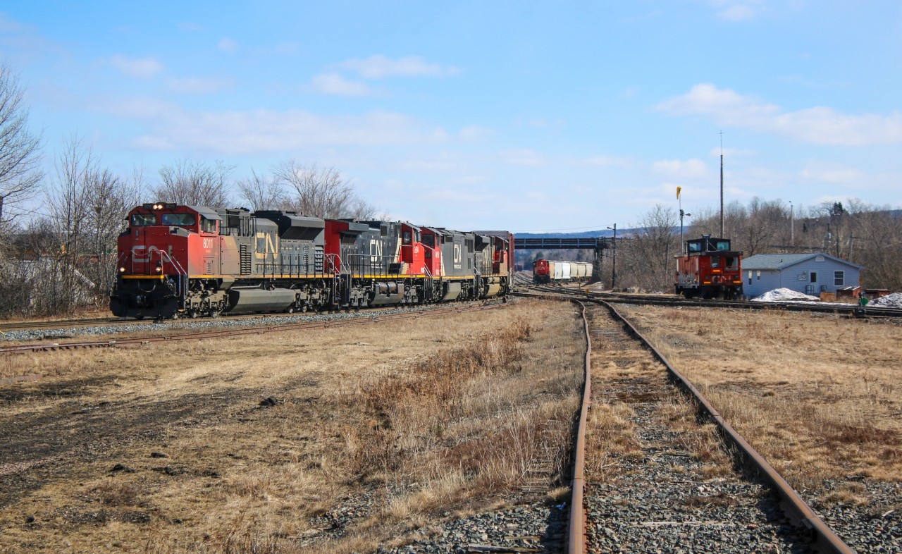 CN 8011 and three helpers CN 2694, CN 4618, CN 8941 are assembling a train in the east end of the Truro reload yard