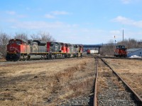 CN 8011 and three helpers CN 2694, CN 4618, CN 8941 are assembling a train in the east end of the Truro reload yard 