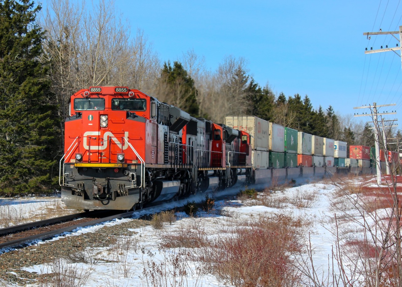 CN 8855 leads a container train through Eastmines just minutes before Debert heading to the Port of Halifax container terminal